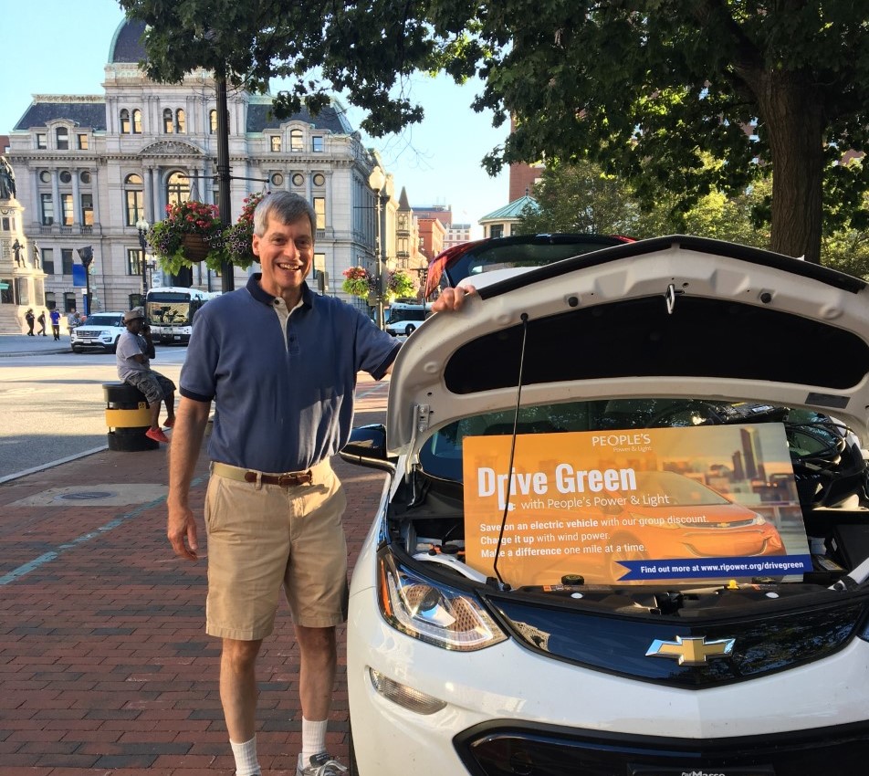Man with his Chevrolet Bolt at our event