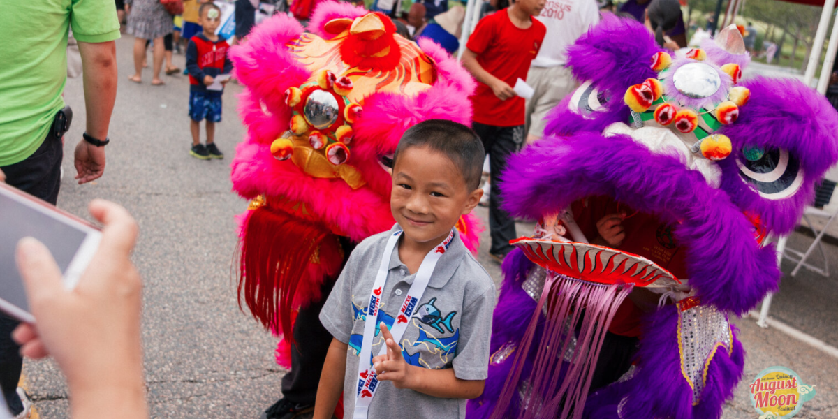 QARI August Moon kids with dragon heads