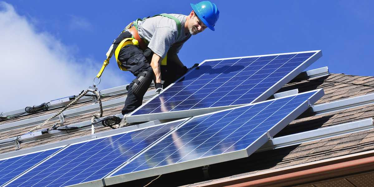 Man on Solar Roof